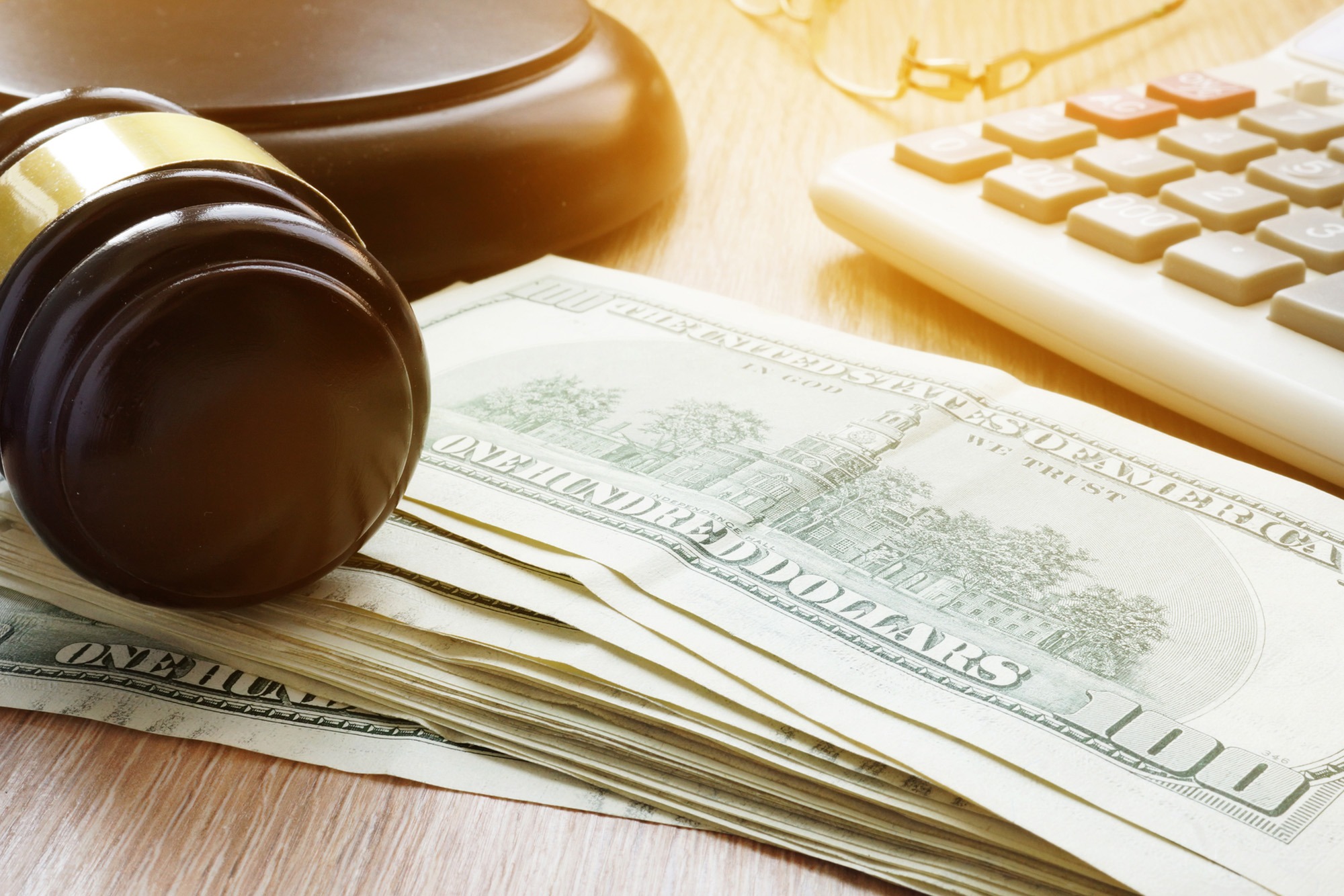 Bail bond concept. Gavel and dollar banknotes