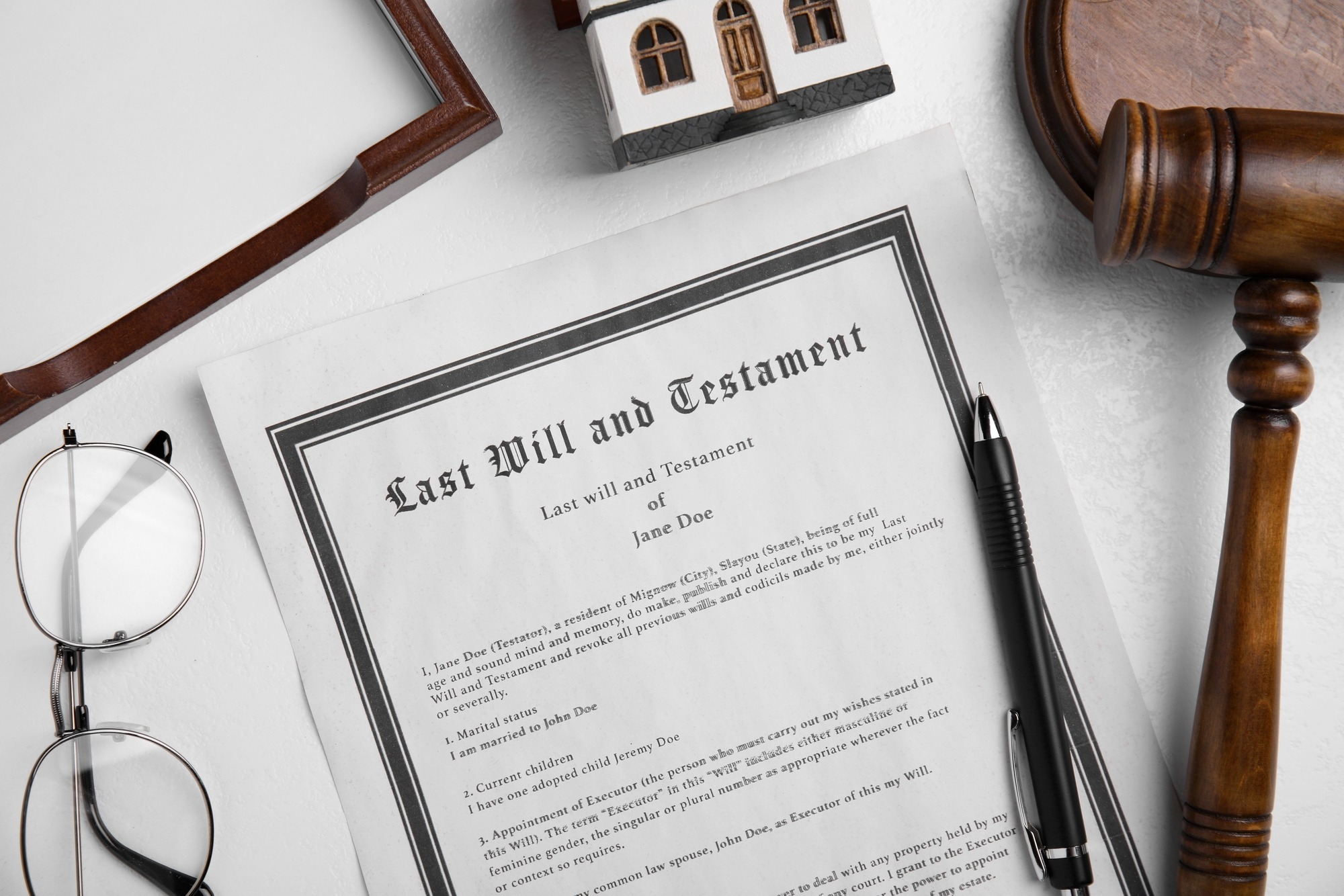 Last will and testament near house model